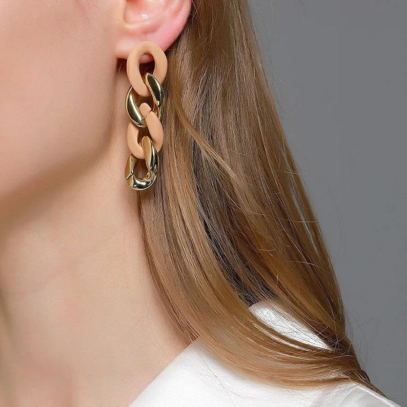 Black and khaki rubber chain tassel long drop punk dangle earrings showcasing modern elegance and style.