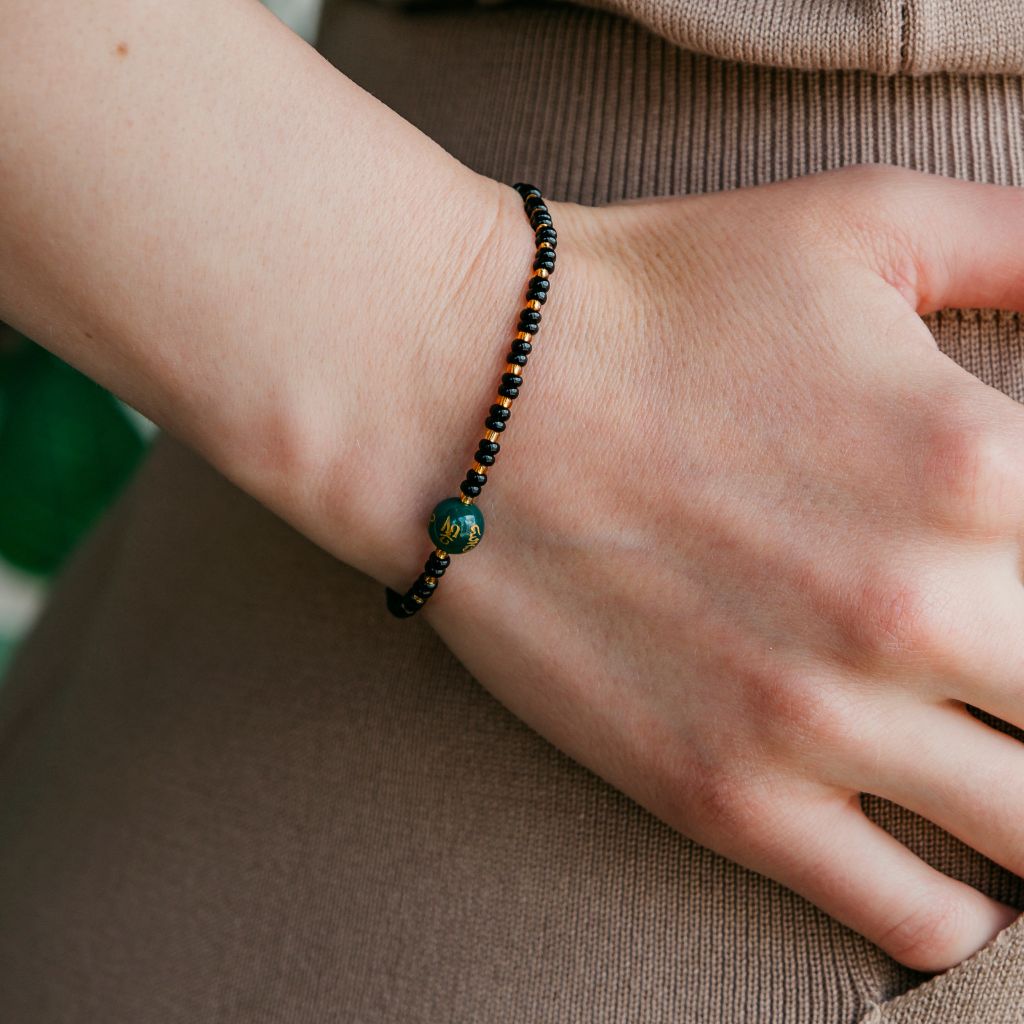 Black Bead Buddhist Tibetan Prayer Monk OM Mantra Nazaria Bracelet with intricate prayer beads and a minimalist design.