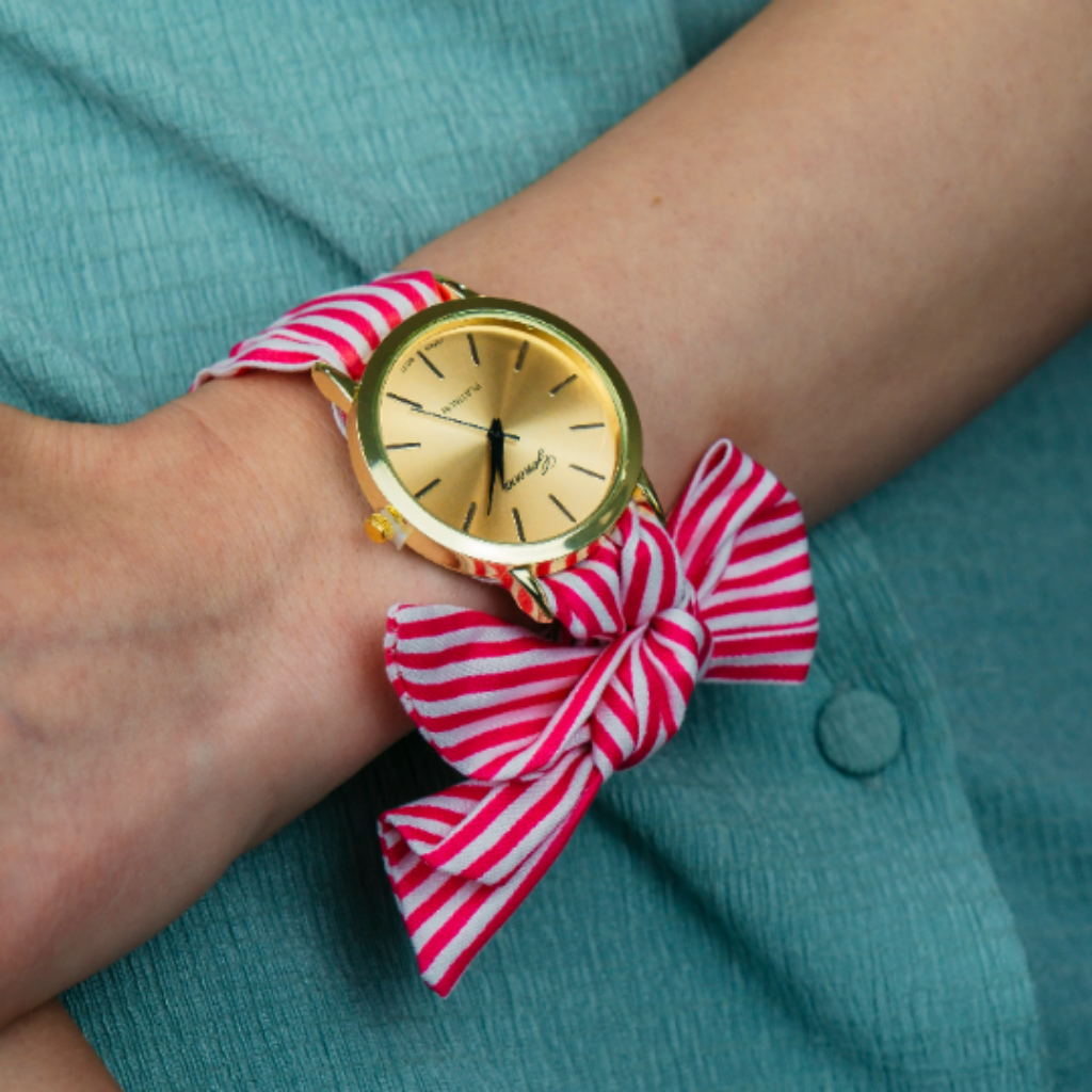 Black Changeable Stripe Cloth Women Bracelet Wristwatch with a stylish cotton strap and metal dial, showcasing its unique tie closure.