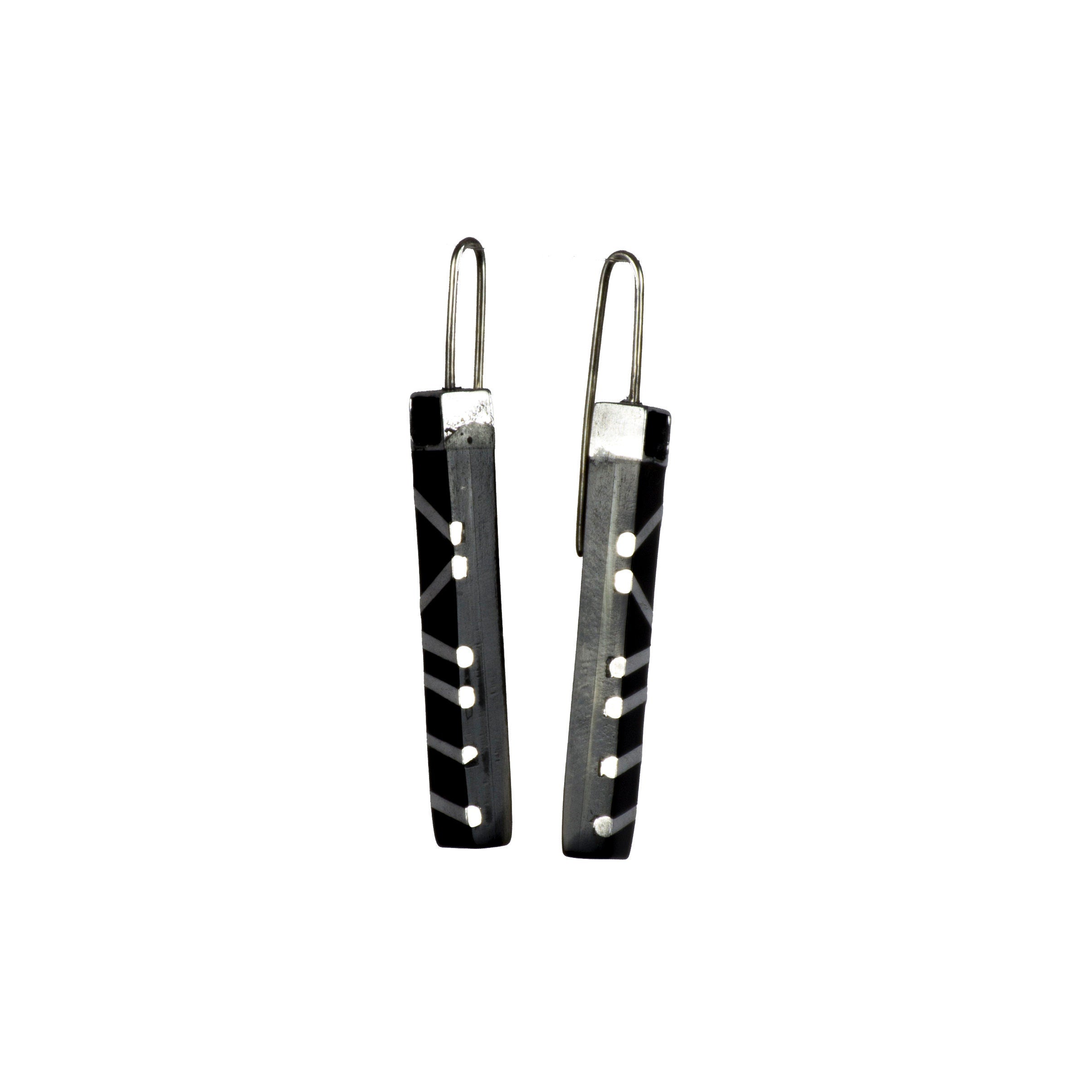 A pair of elegant black horn and aluminum earrings with a 925 sterling silver ear lock, showcasing a unique and stylish design.