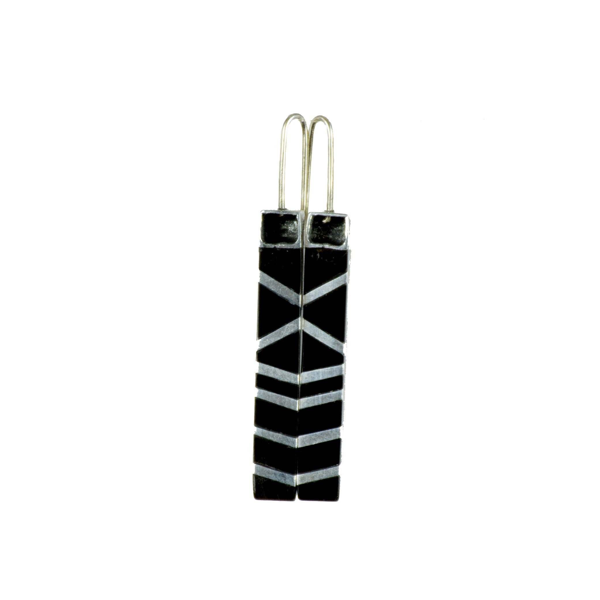 A pair of elegant black horn and aluminum earrings with a 925 sterling silver ear lock, showcasing a unique and stylish design.