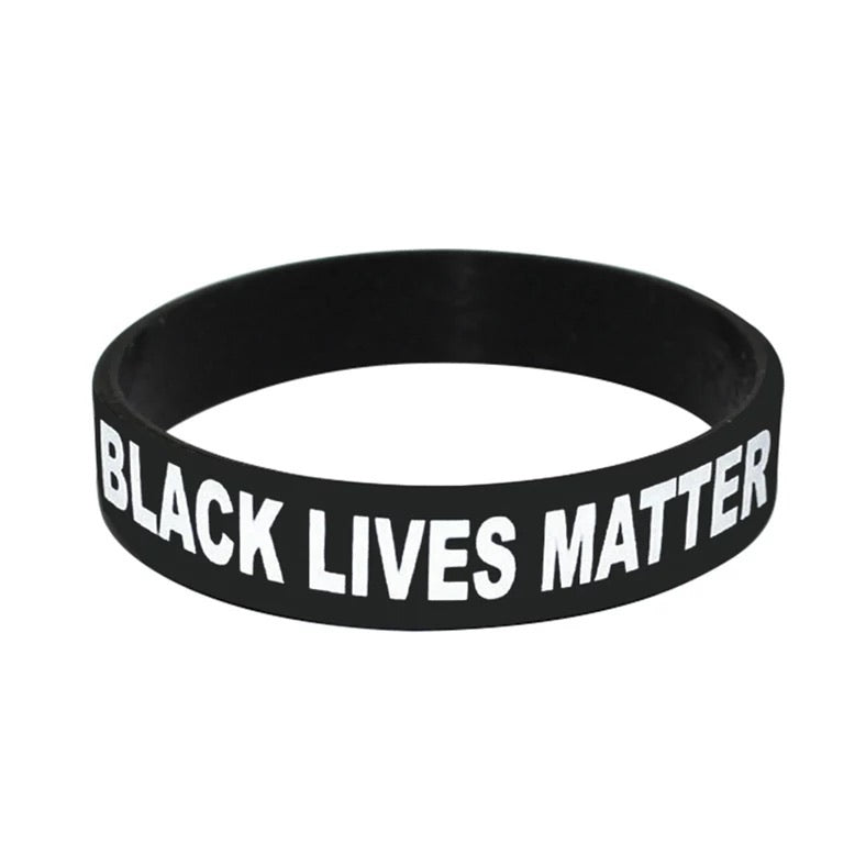 Black Lives Matter Bracelet Set featuring a silicone bracelet and a handcrafted Black Onyx beaded bracelet, symbolizing strength and remembrance.