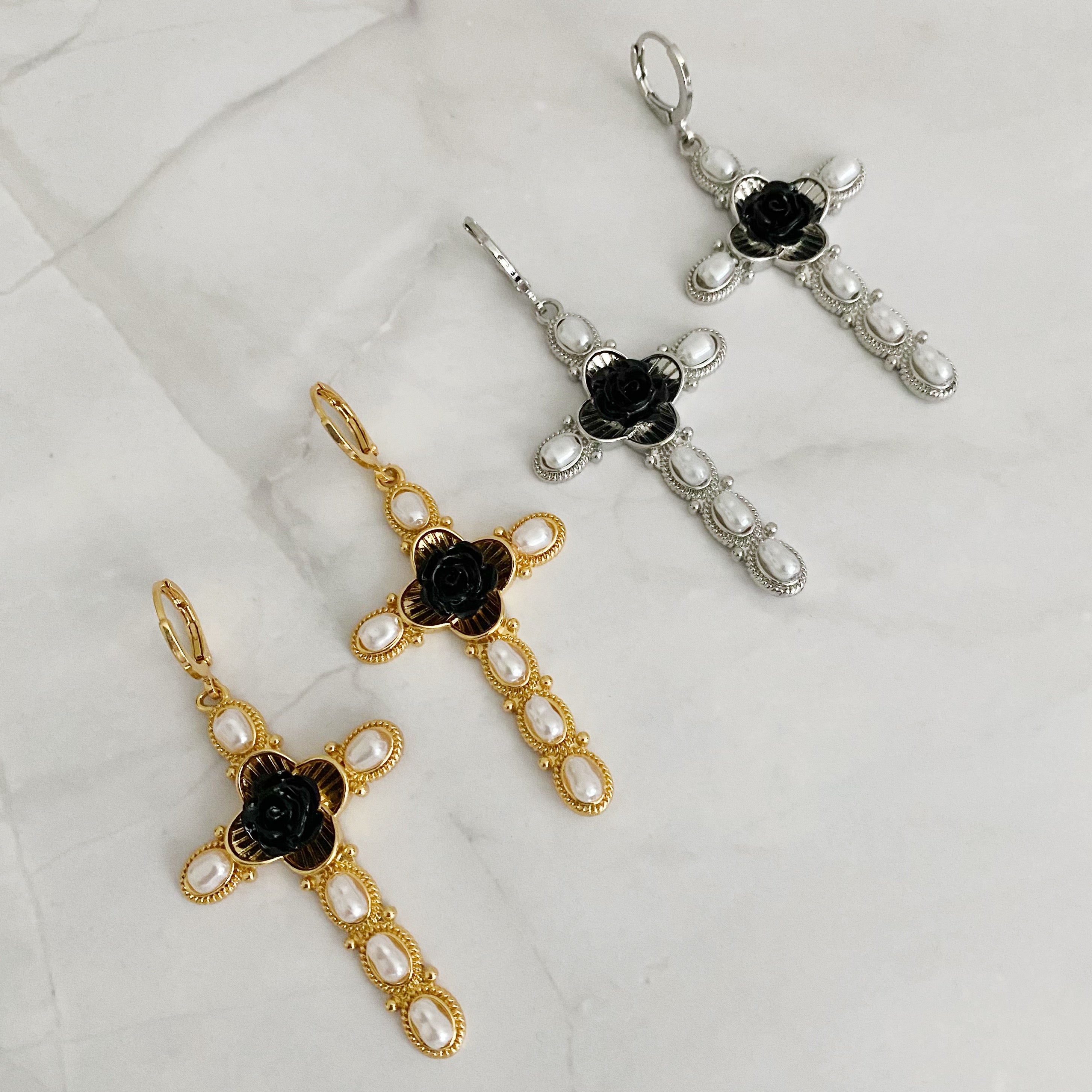 Elegant Black Rose Cross Earrings featuring pearls and gold plating, perfect for stylish outfits.