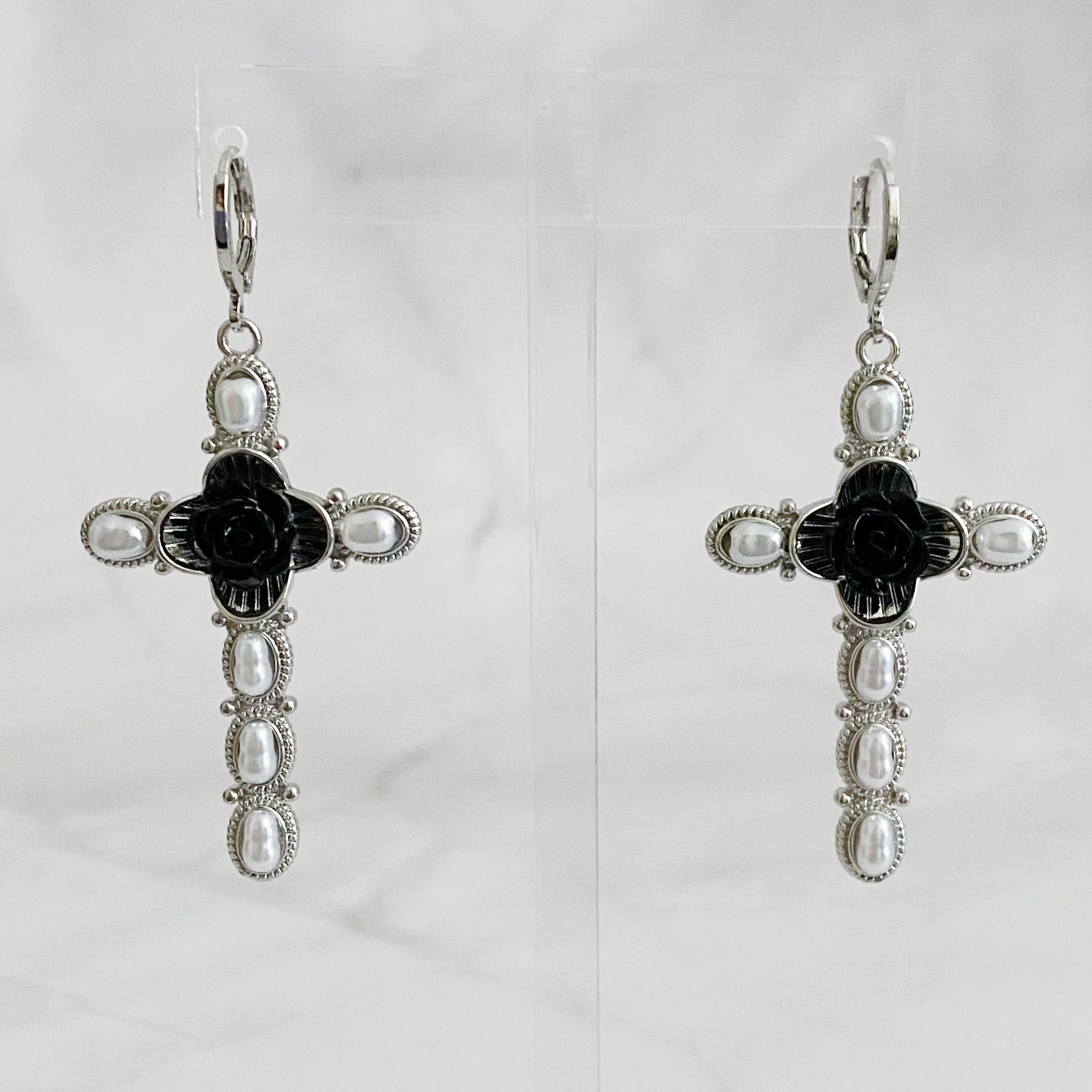 Elegant Black Rose Cross Earrings featuring pearls and gold plating, perfect for stylish outfits.