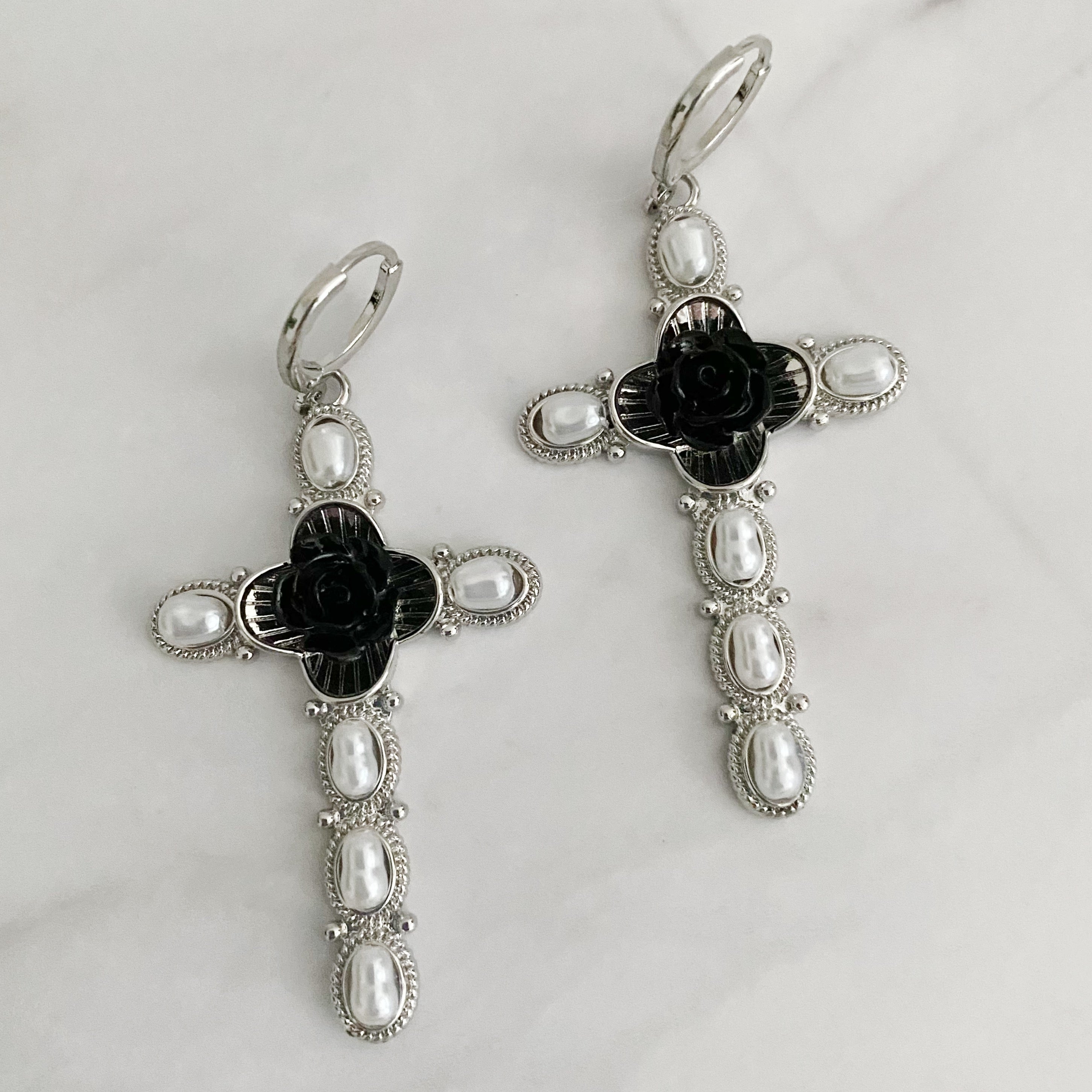 Elegant Black Rose Cross Earrings featuring pearls and gold plating, perfect for stylish outfits.