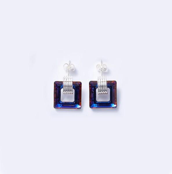 Elegant black square shaped studs in 14K white gold plating, showcasing a modern design perfect for any occasion.