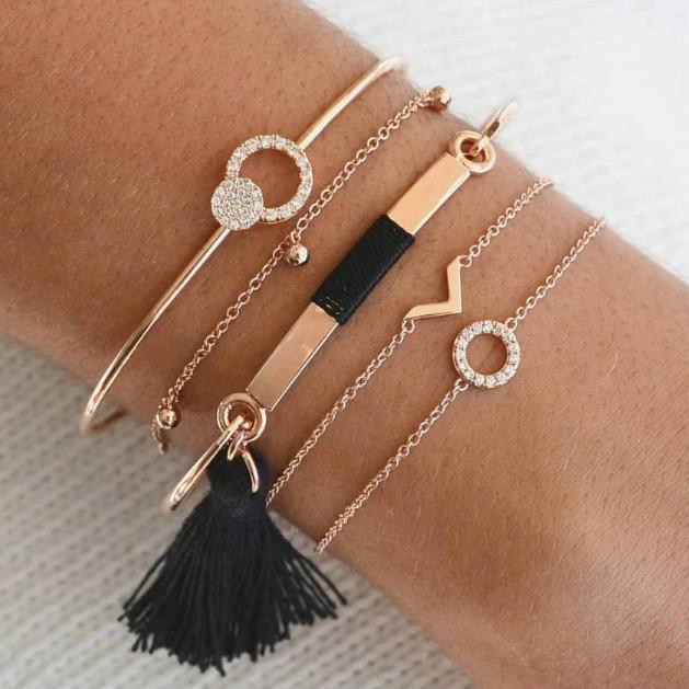 Black Tassel Pav'e 5 Piece Bracelet Set featuring 14K gold plating, black tassel design, and white crystal pav'e accents.