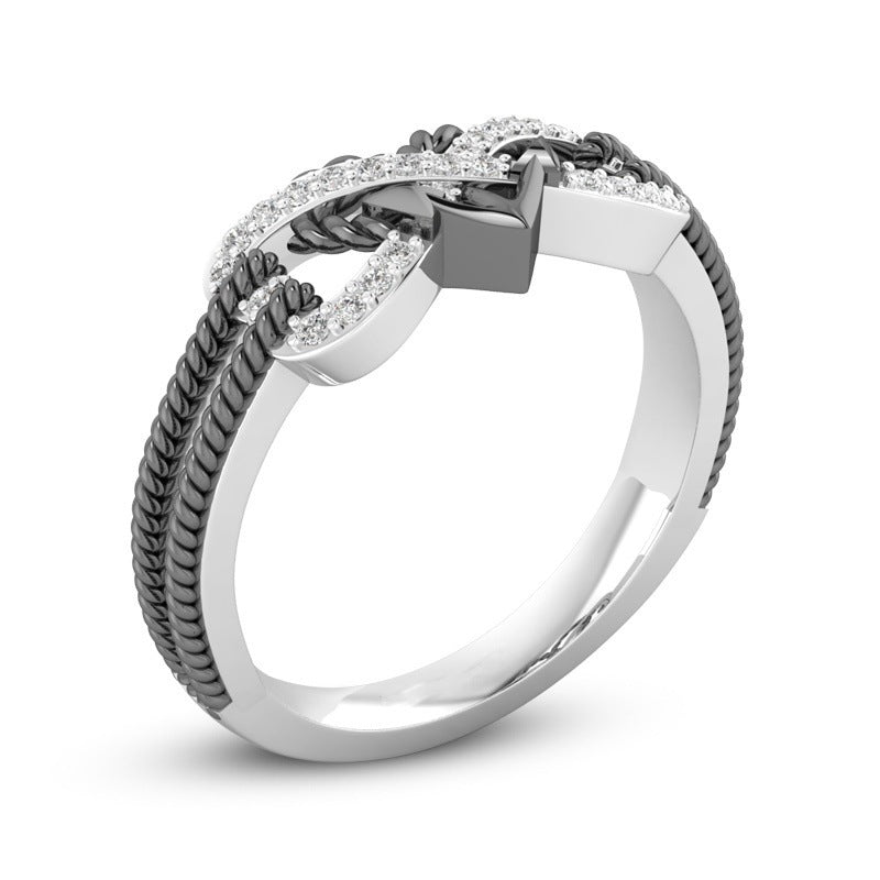 Black & White Italian Crystal Pav'e Rope Forever Love Ring featuring intertwined design and white stone, plated in 14K white gold.