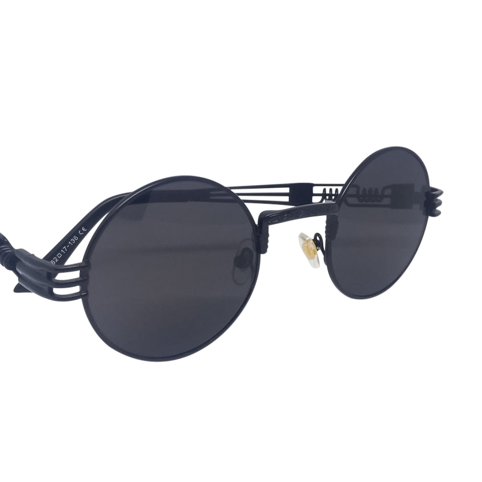 A pair of stylish Black x Black Sunglasses made from metal and acrylic, featuring a sleek design suitable for any occasion.