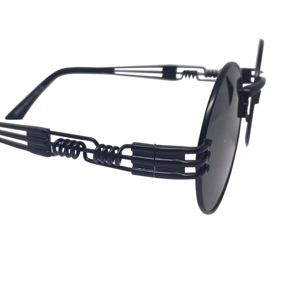 A pair of stylish Black x Black Sunglasses made from metal and acrylic, featuring a sleek design suitable for any occasion.