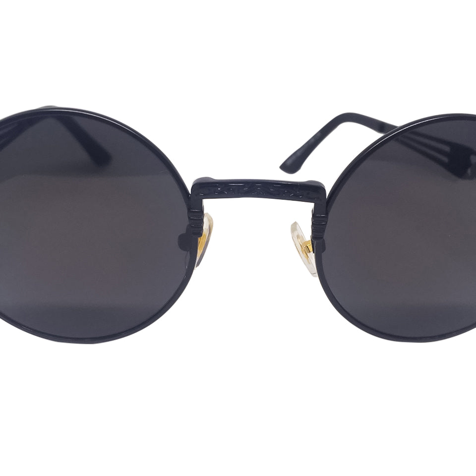 A pair of stylish Black x Black Sunglasses made from metal and acrylic, featuring a sleek design suitable for any occasion.