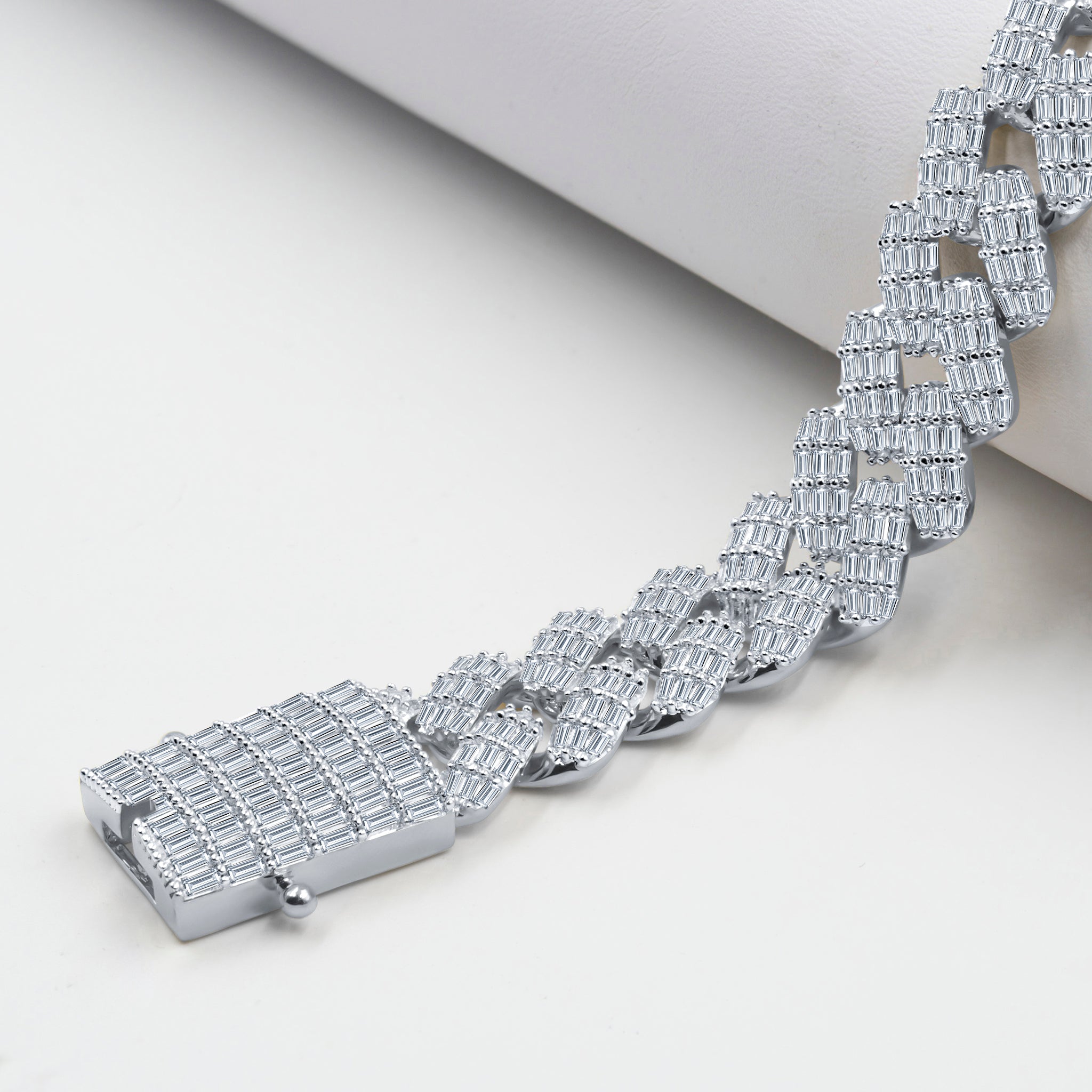 BLANQUEAR 16MM iced out bracelet featuring durable brass and sparkling AAA Cubic Zirconia stones, elegantly designed for a bold statement.