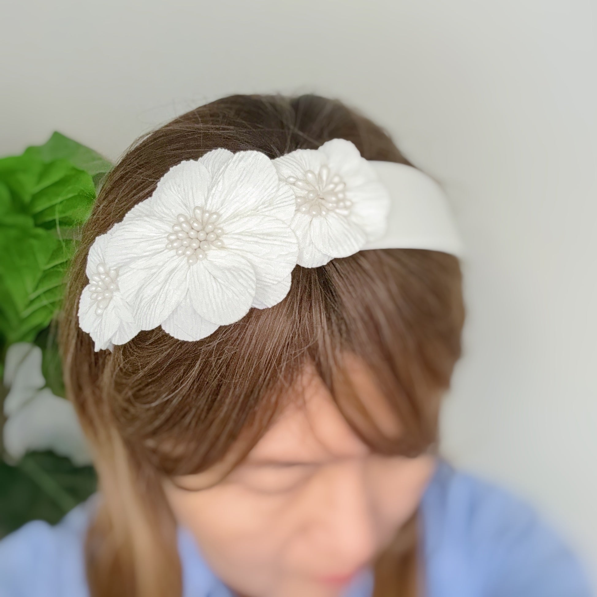 Bloom Beauty Headband featuring a blooming flower design, perfect for enhancing any outfit with elegance.