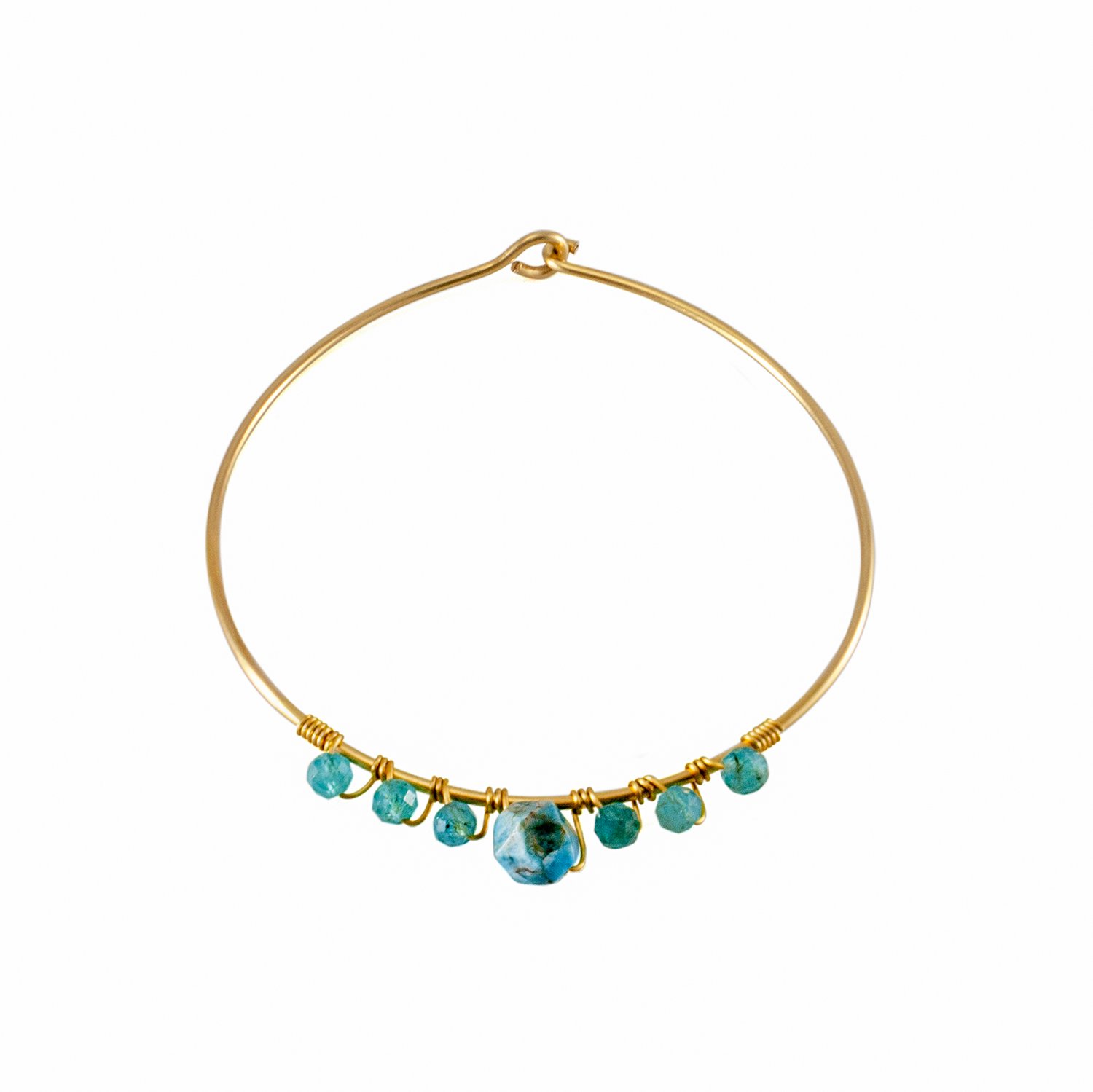 A beautiful blue apatite beaded gold bangle featuring 4mm and 8mm apatite stones, set in a gold-plated brass design.