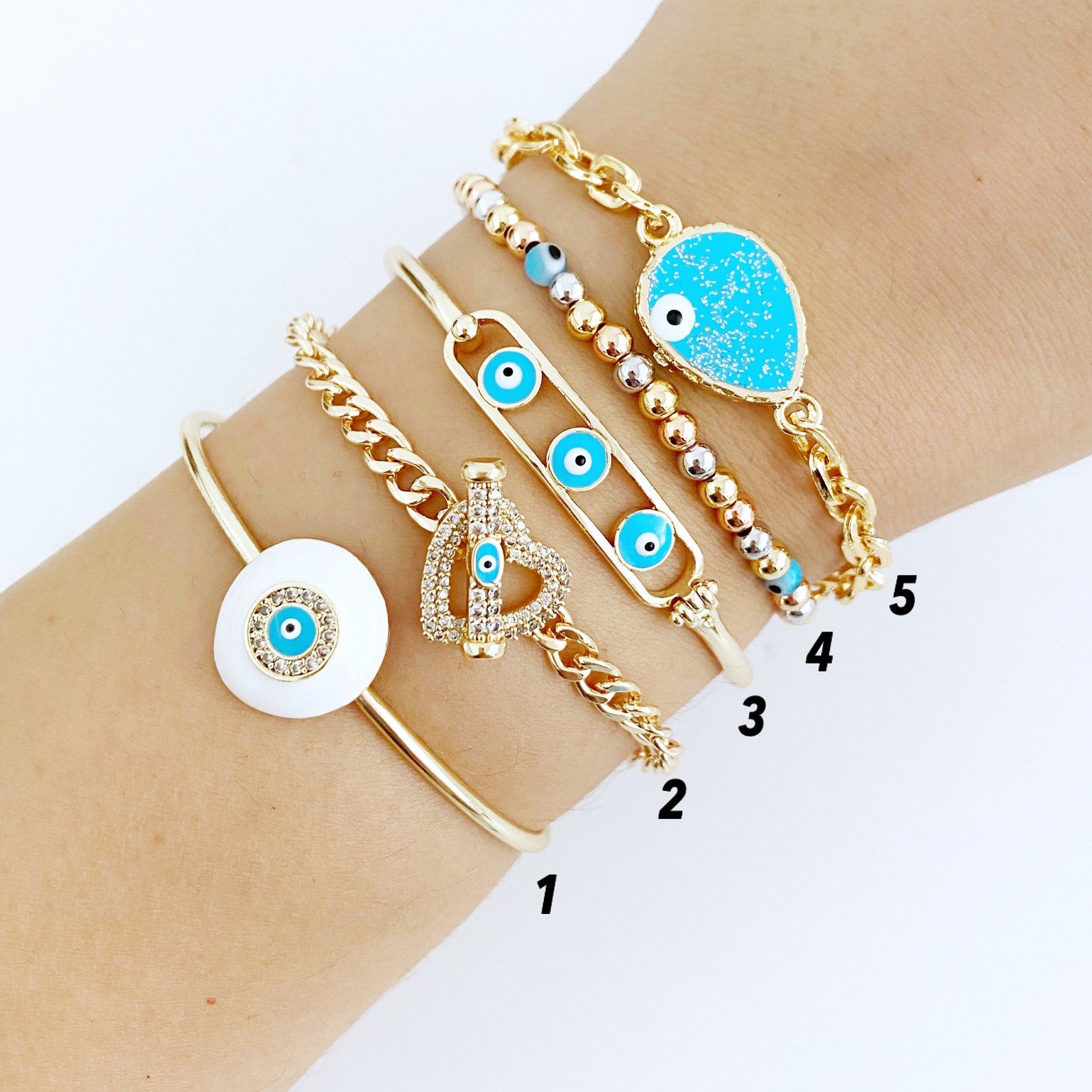 A beautiful Blue Evil Eye Bracelet featuring a movable oval charm, crafted from tarnish-resistant 316L stainless steel, perfect for everyday wear.