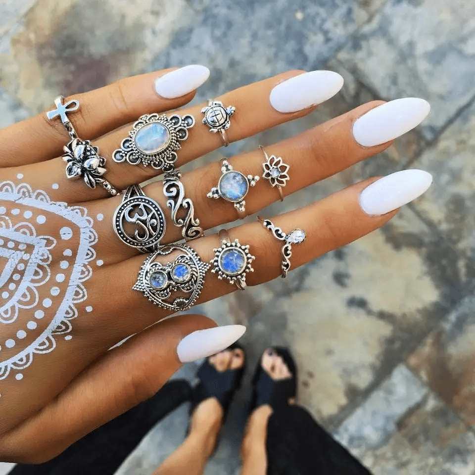 Blue Lotus Vintage Women's 11 Piece Rings Set featuring various stylish Boho rings with silver crystals, perfect for mixing and matching.