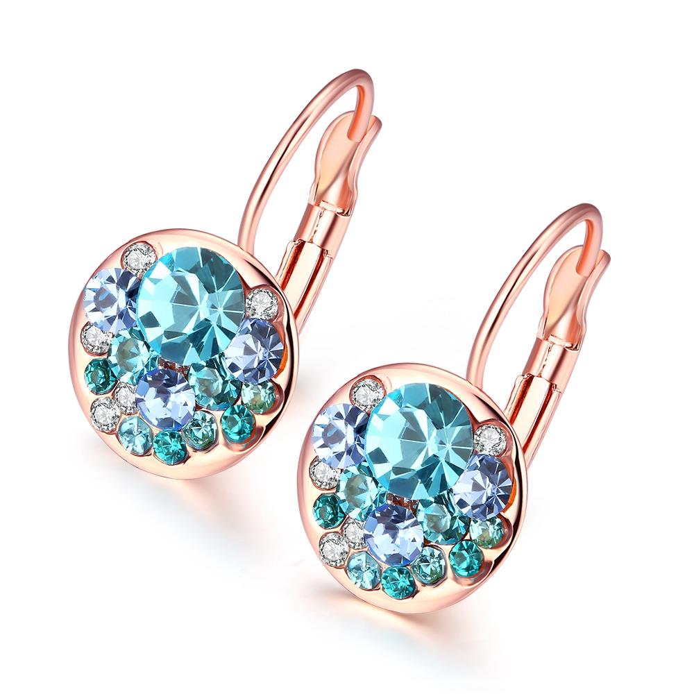 Elegant Blue Periwinkle Leverback Earrings crafted in 14K Rose Gold, featuring certified crystals and a lightweight design.