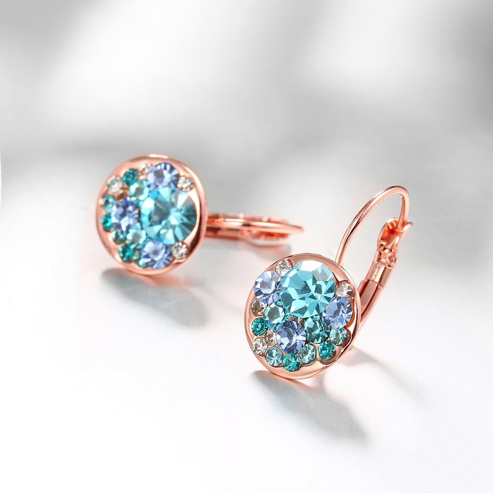 Elegant Blue Periwinkle Leverback Earrings crafted in 14K Rose Gold, featuring certified crystals and a lightweight design.