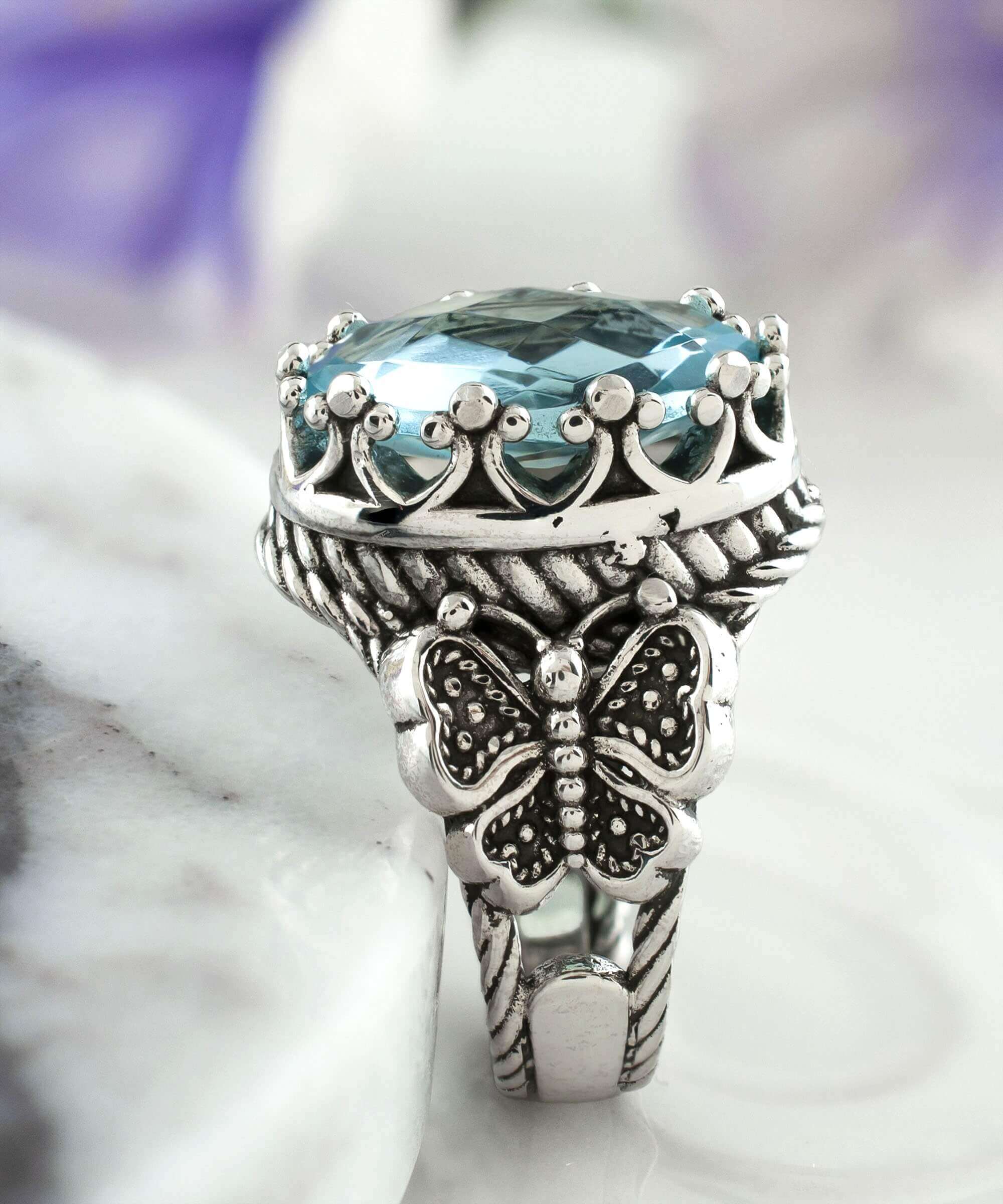 Elegant Blue Topaz Gemstone Filigree Art Double Butterfly Ring in 925 sterling silver, showcasing intricate detailing and a stunning sky blue topaz.