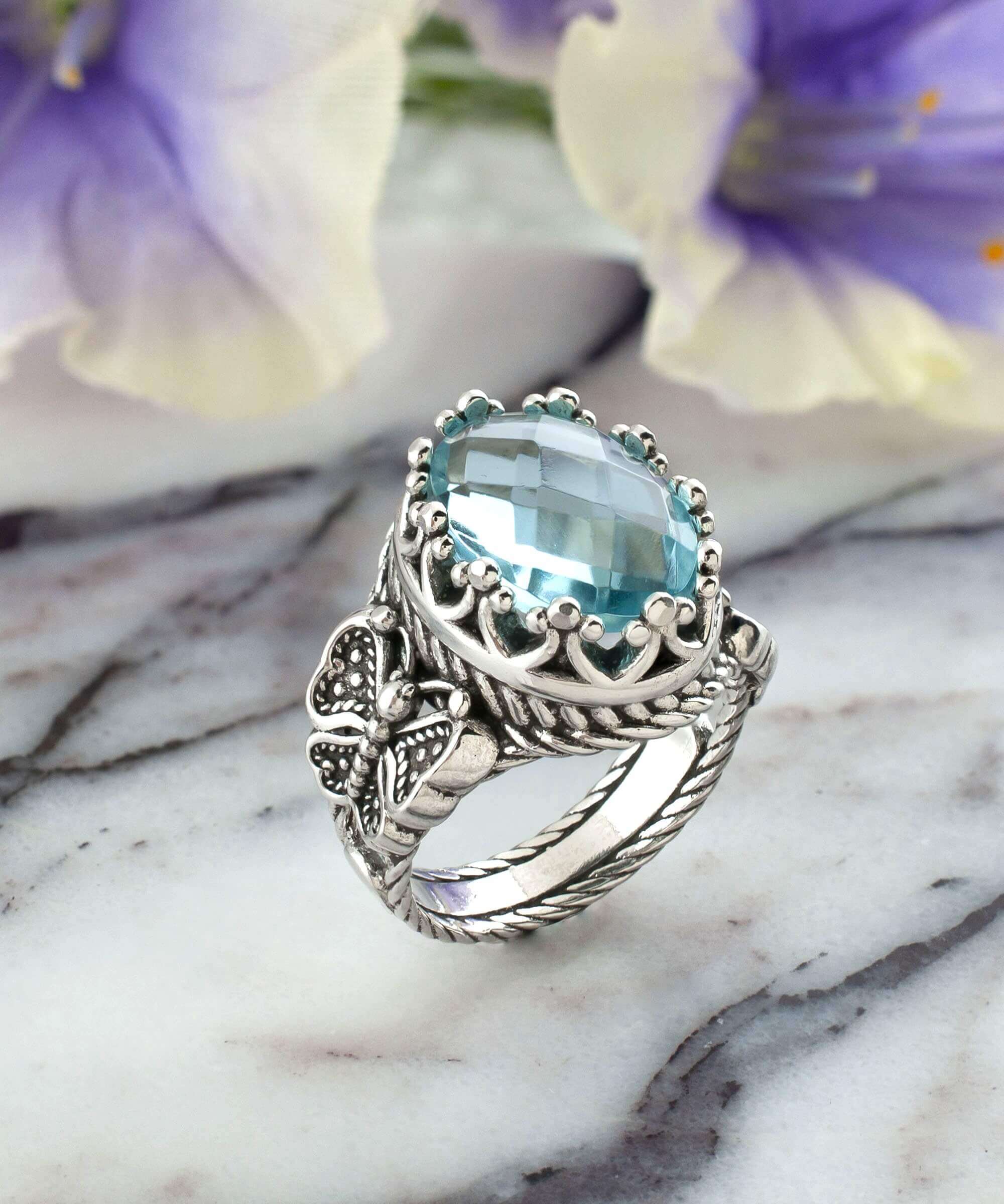 Elegant Blue Topaz Gemstone Filigree Art Double Butterfly Ring in 925 sterling silver, showcasing intricate detailing and a stunning sky blue topaz.