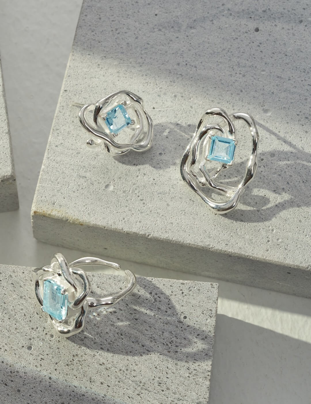 Handmade Blue Topaz Statement Ring in sterling silver, featuring a 7mm blue topaz gemstone, adjustable size, and tarnish-resistant finish.