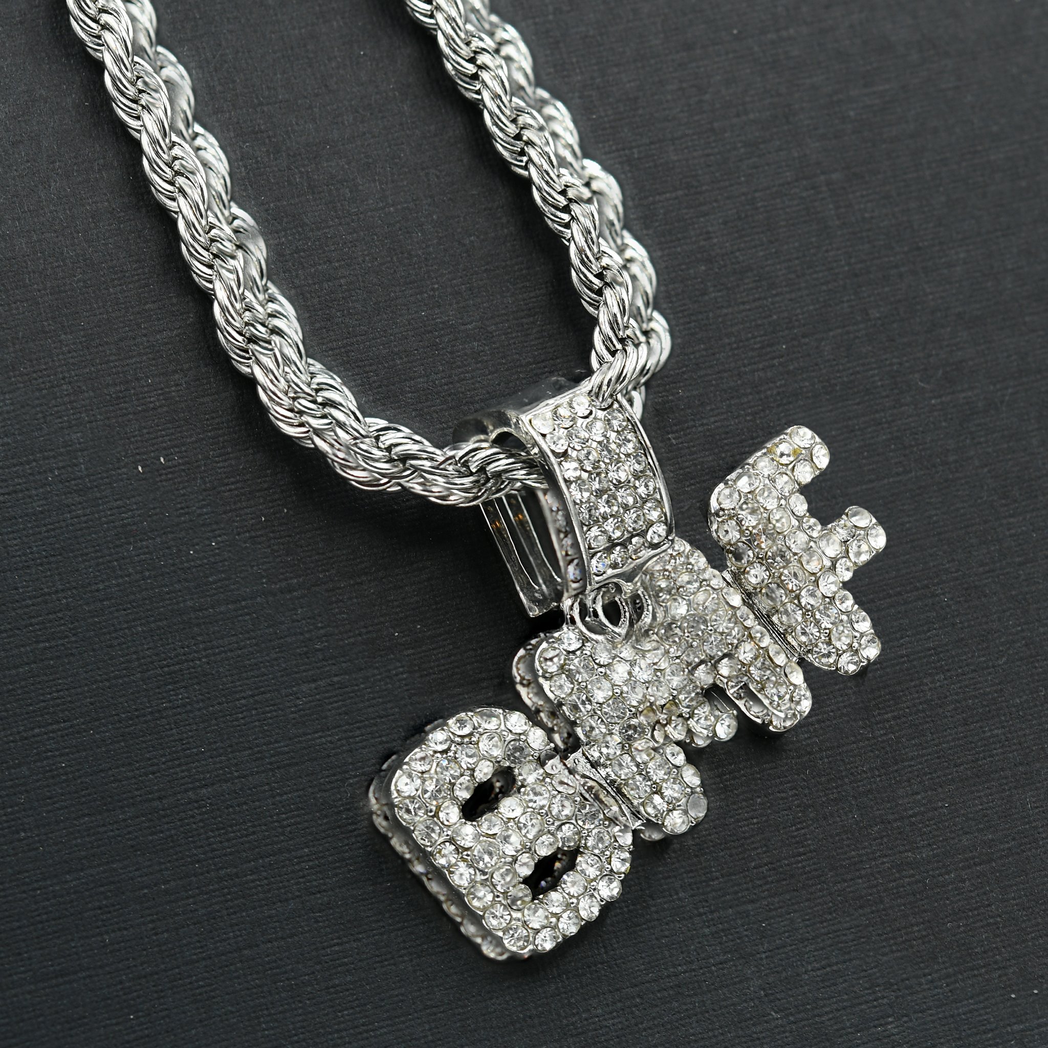 BMF Chain and Charm featuring a crystal stone studded pendant on a 24'' rope chain, showcasing intricate hip-hop jewelry design.