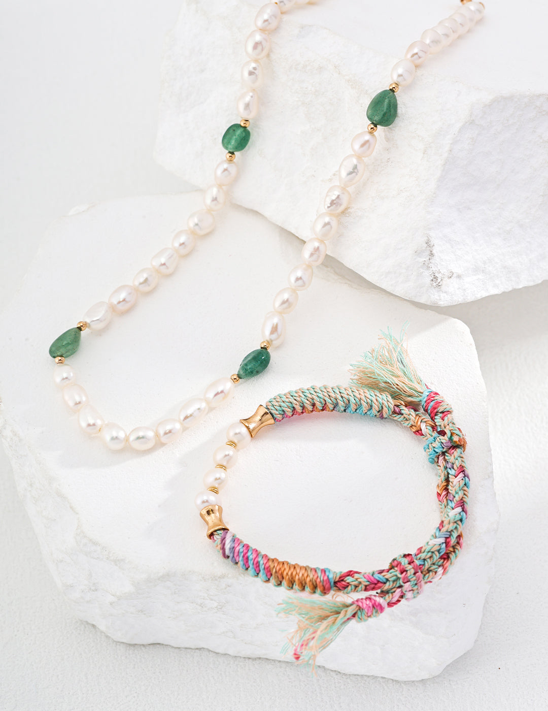 A handmade natural pearl bracelet featuring colorful hemp rope, showcasing a bohemian style with adjustable length for a perfect fit.