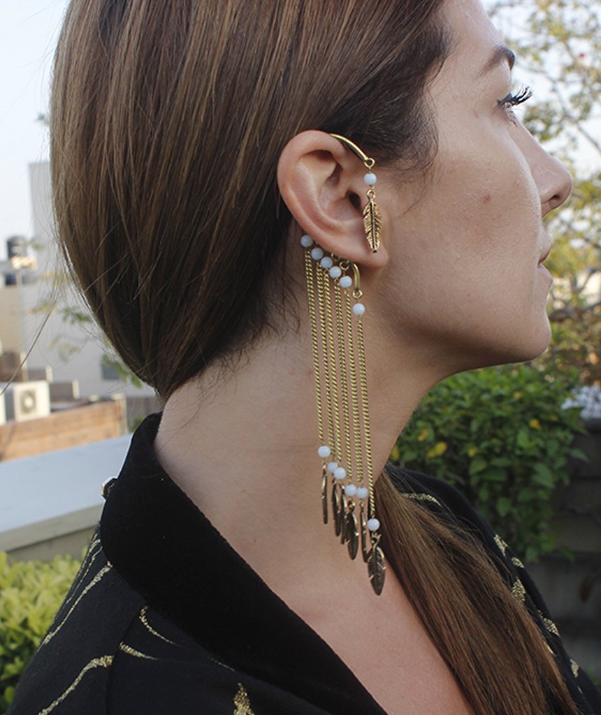 Boho Earcuff featuring feathers and beads, elegantly designed with intricate chains, perfect for casual and party looks.