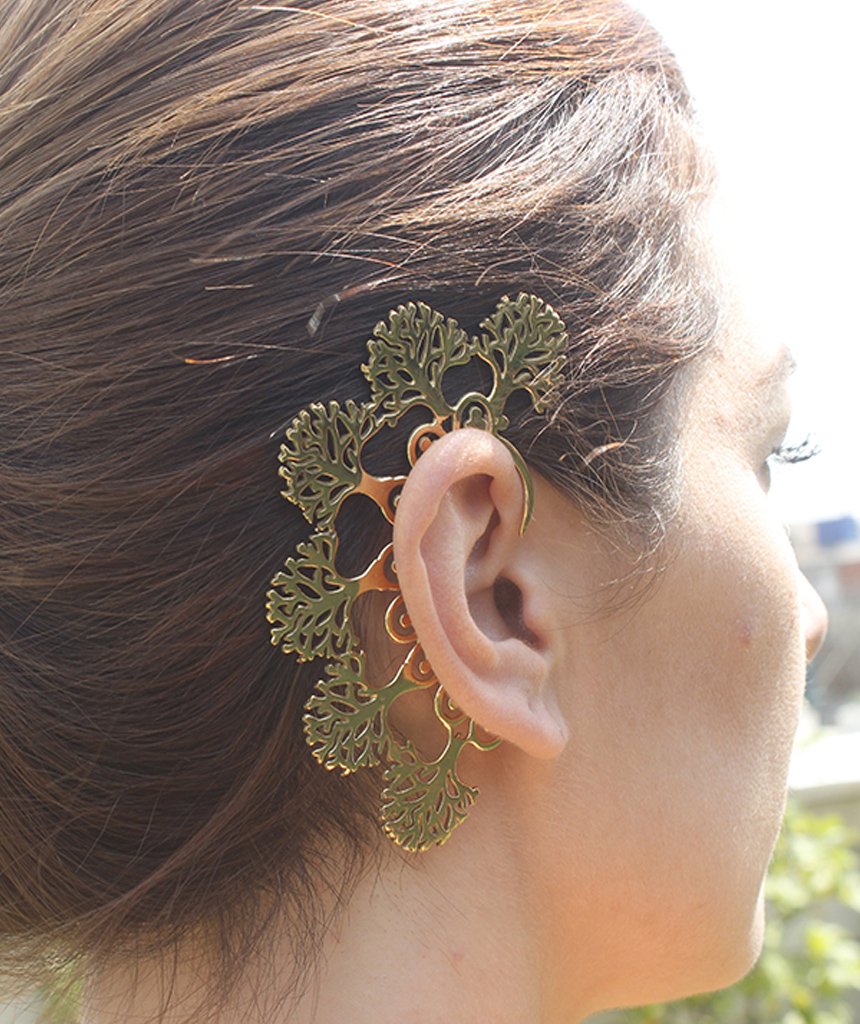 Boho Tree Earcuff featuring a detailed tree of life design in gold and silver, elegantly wrapping around the ear.