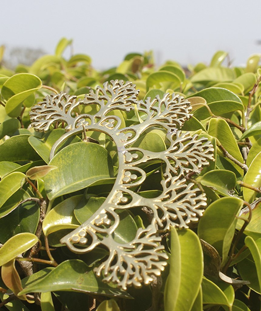 Boho Tree Earcuff featuring a detailed tree of life design in gold and silver, elegantly wrapping around the ear.