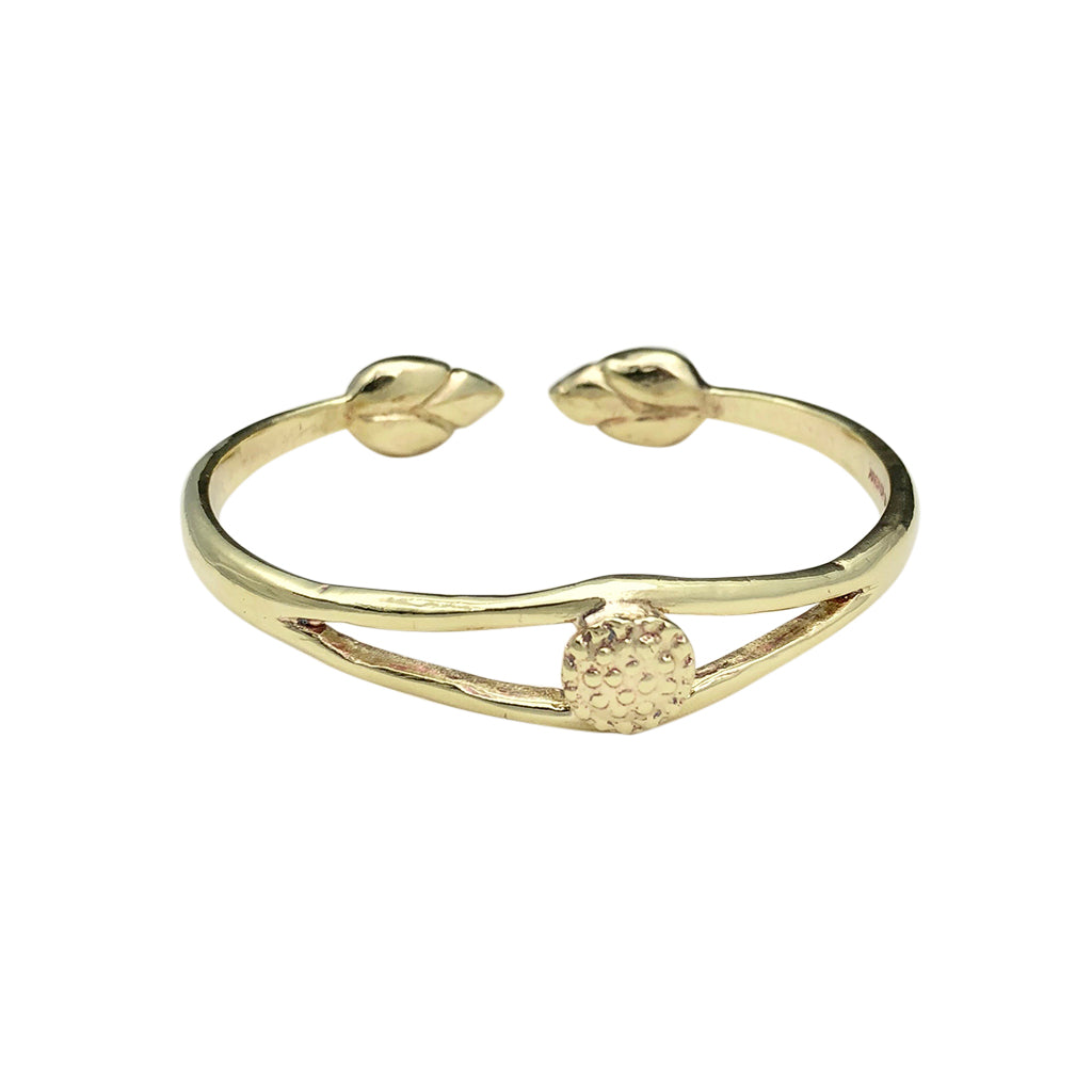 Gold bracelet with leaf ends.