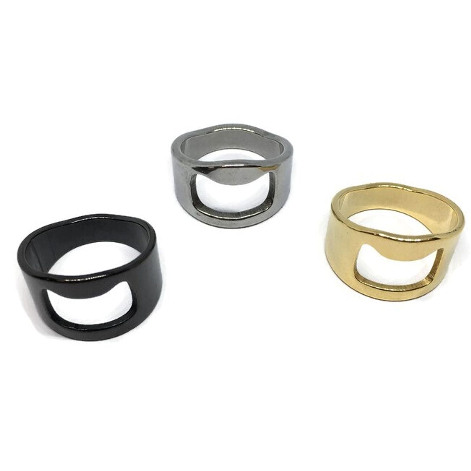 A stylish stainless steel ring designed as a bottle opener, showcasing its sleek finish and lightweight design.