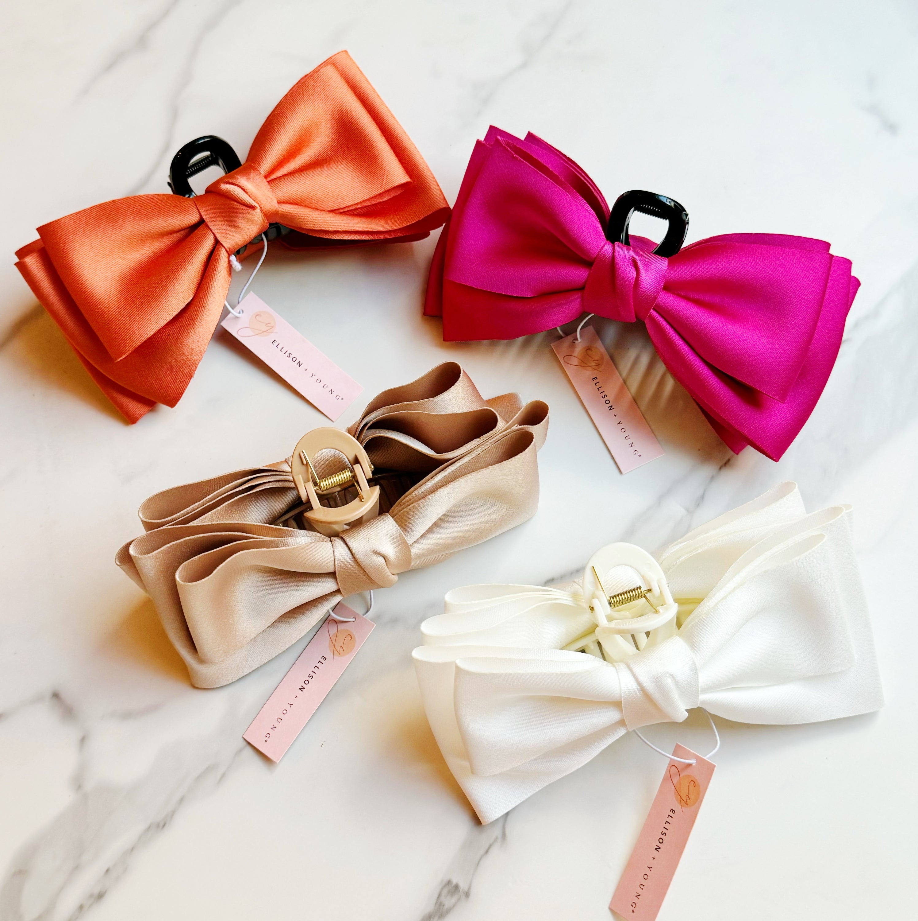 Bow Beauty Hair Claw featuring a stylish bow design, available in multiple colors, perfect for game days.