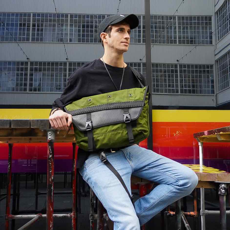 Bradley Upcycled Water Resistant Bike Messenger Bag made from reclaimed materials, featuring adjustable straps and a padded laptop compartment.