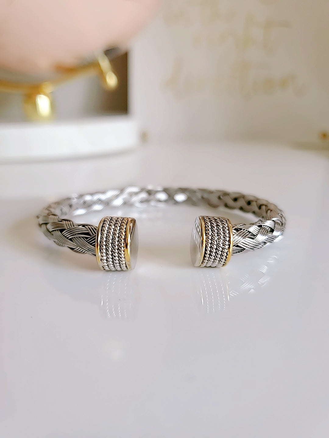 Elegant Braided Silver Cable Bangle Bracelet made of stainless steel and gold filled, showcasing intricate braided design.