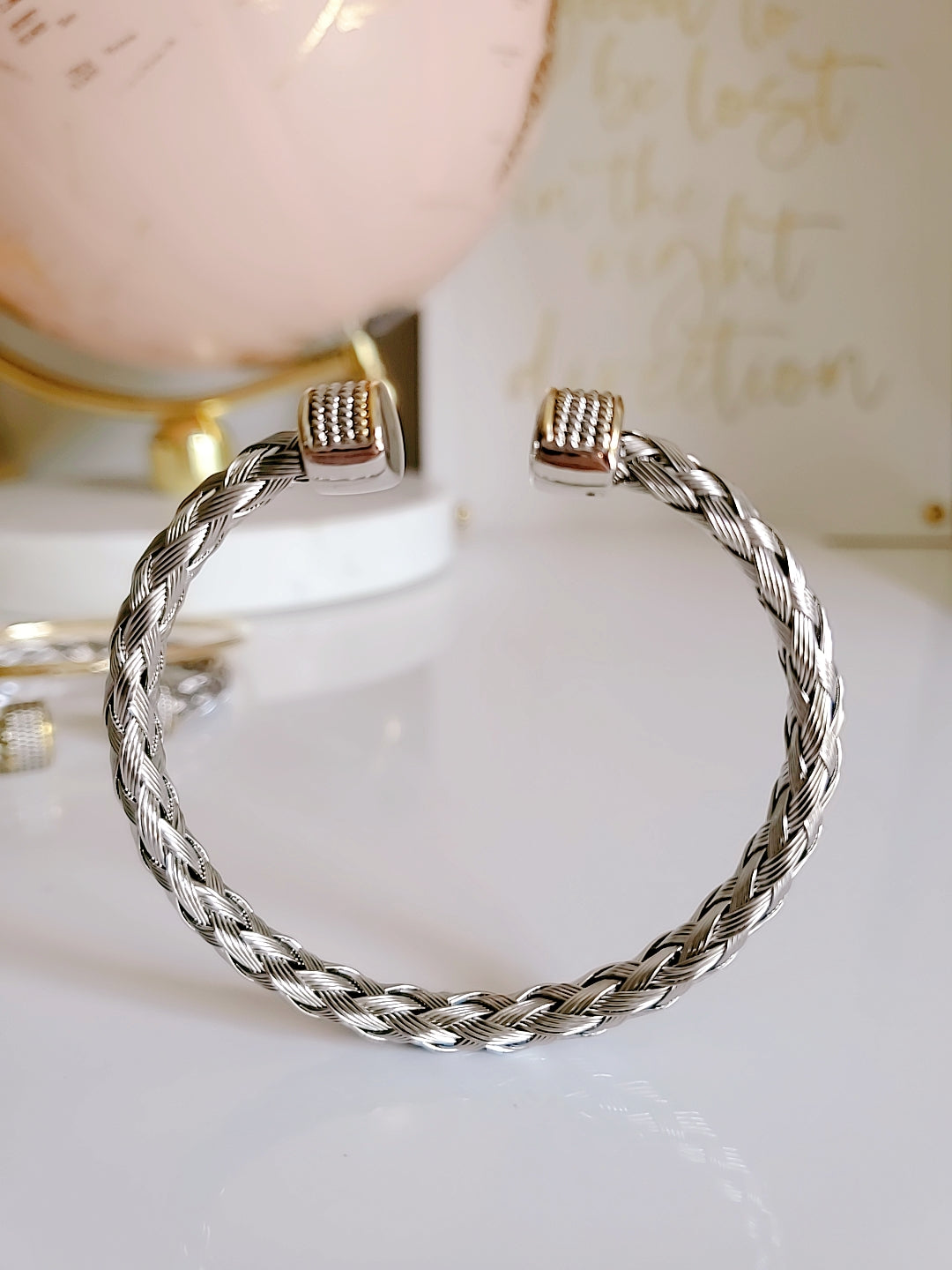 Elegant Braided Silver Cable Bangle Bracelet made of stainless steel and gold filled, showcasing intricate braided design.