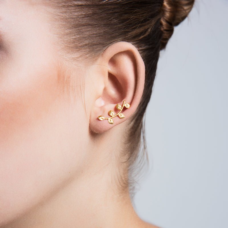 Brass Athena Ear Cuffs and Climber Earrings in Gold with clear CZ crystals, showcasing a stylish and elegant design.