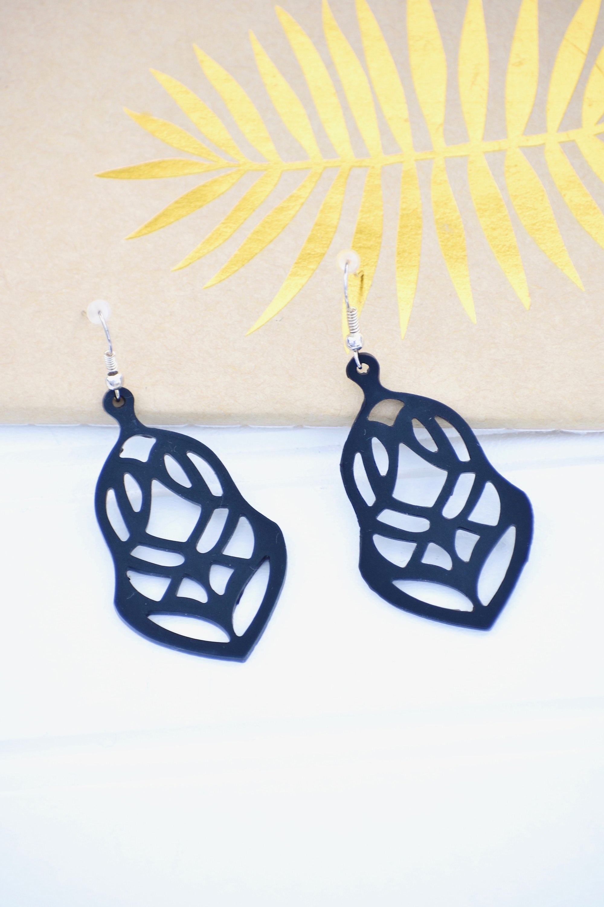 A pair of Brave Earrings displayed elegantly, showcasing their unique design and lightweight features, perfect for any occasion.