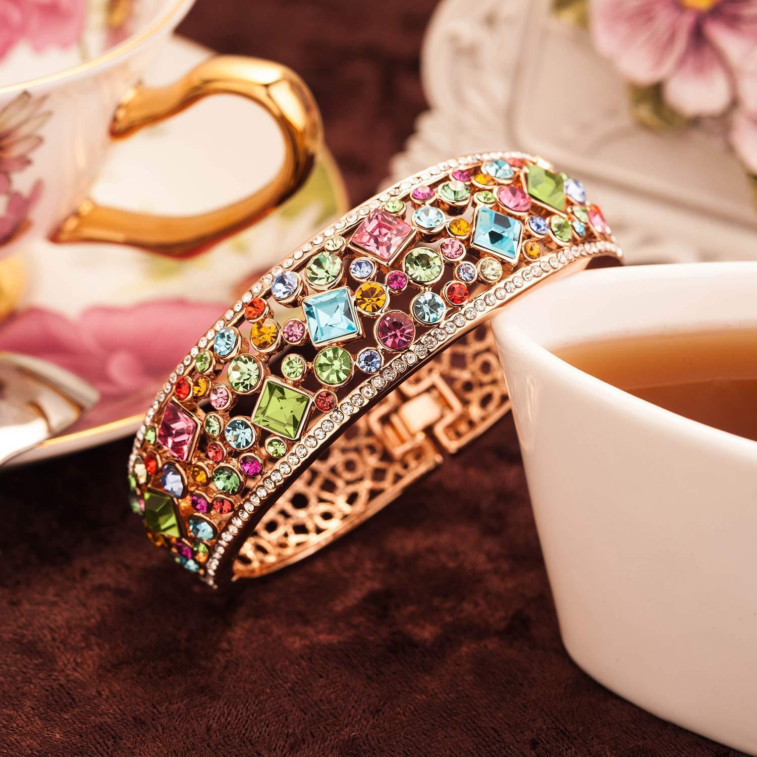 Bregenz Rainbow of Life Bangle in 18K rose gold plating, embellished with sparkling Austrian crystals, showcasing its elegant design.