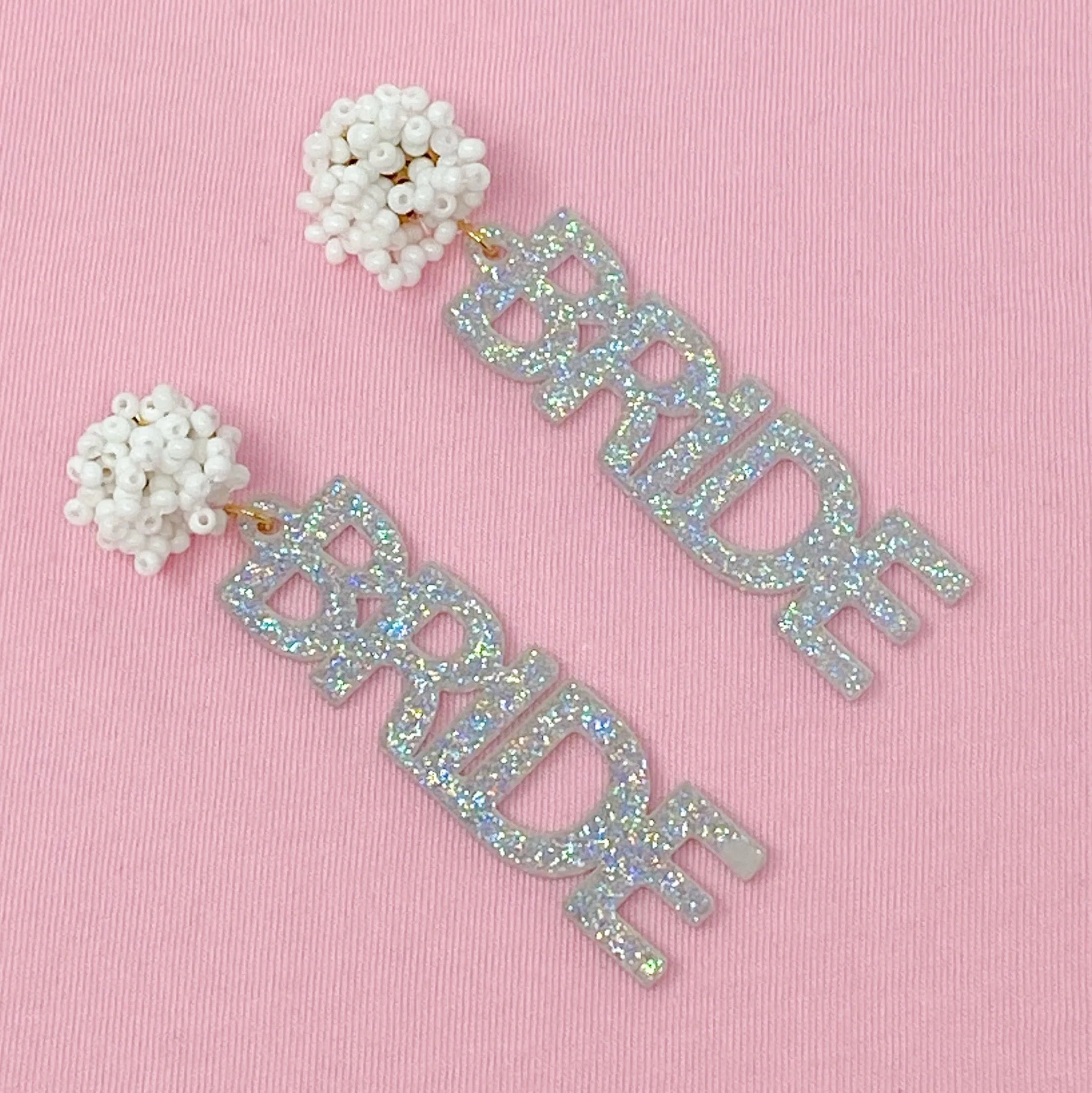 Bride Babe Cutout Acrylic Earrings featuring glittery 'BRIDE' design, perfect for bridal occasions.