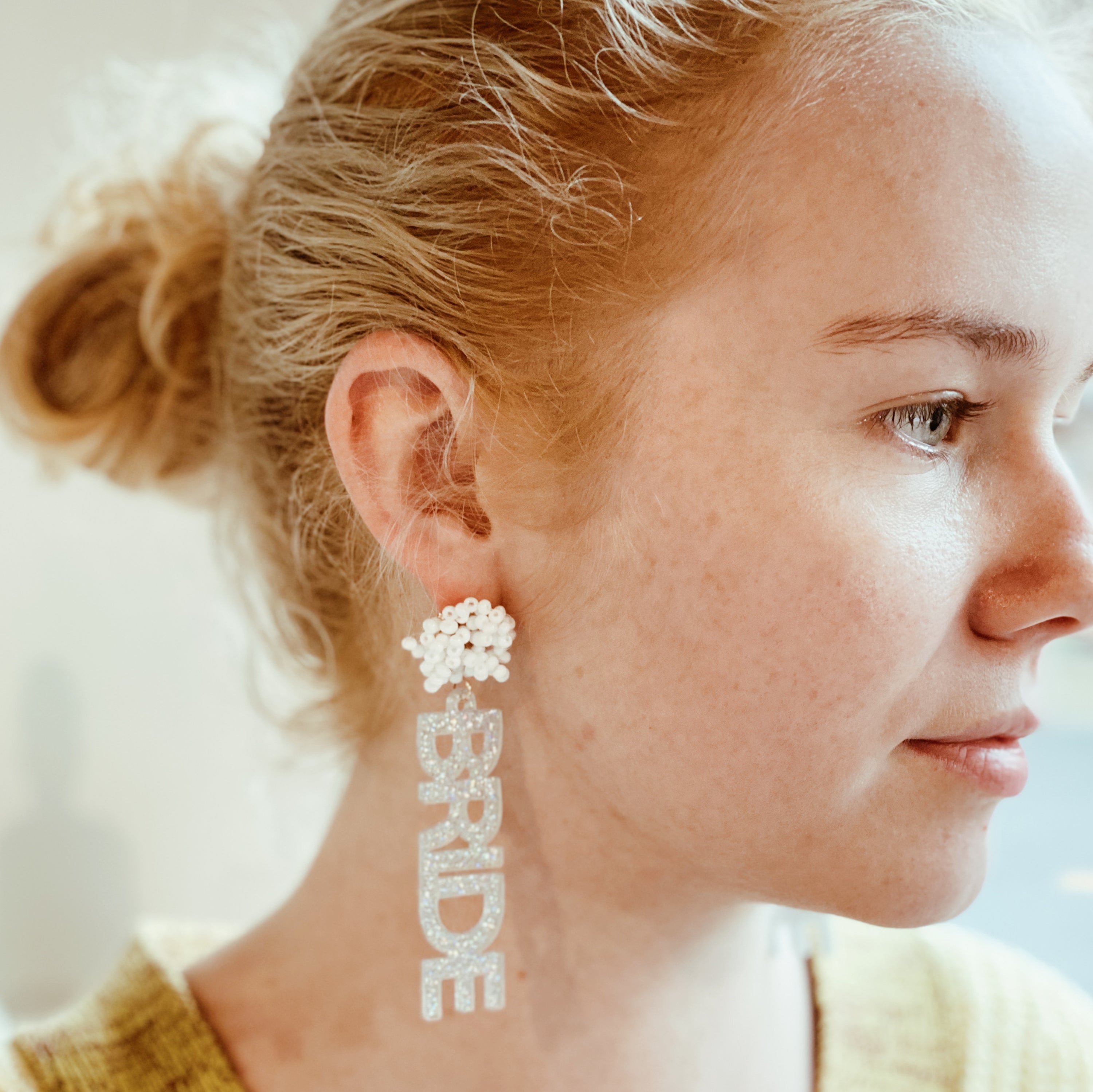 Bride Babe Cutout Acrylic Earrings featuring glittery 'BRIDE' design, perfect for bridal occasions.