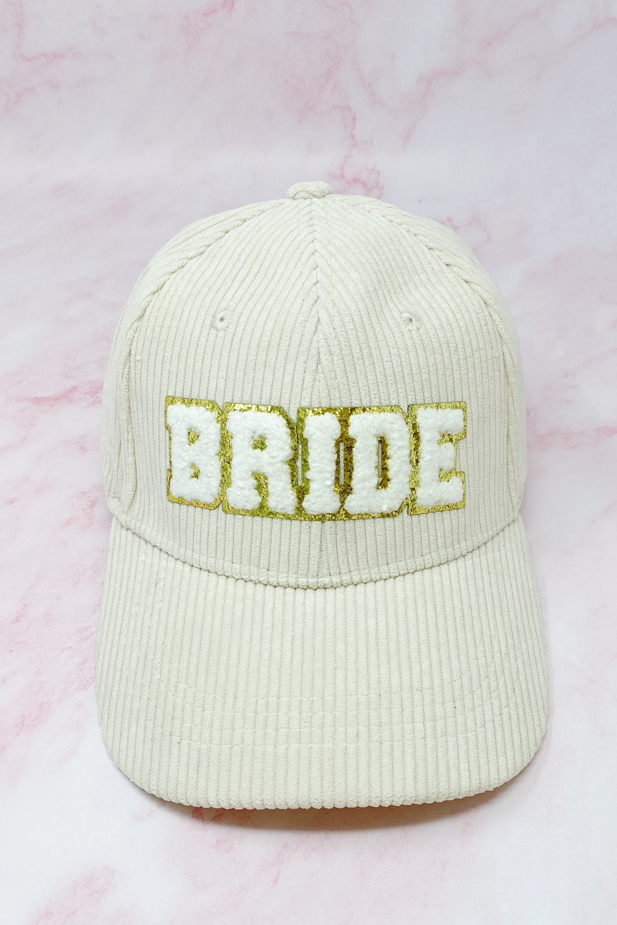 Bride Corduroy Ball Cap featuring gold glittering fuzzy patch lettering and adjustable strap.