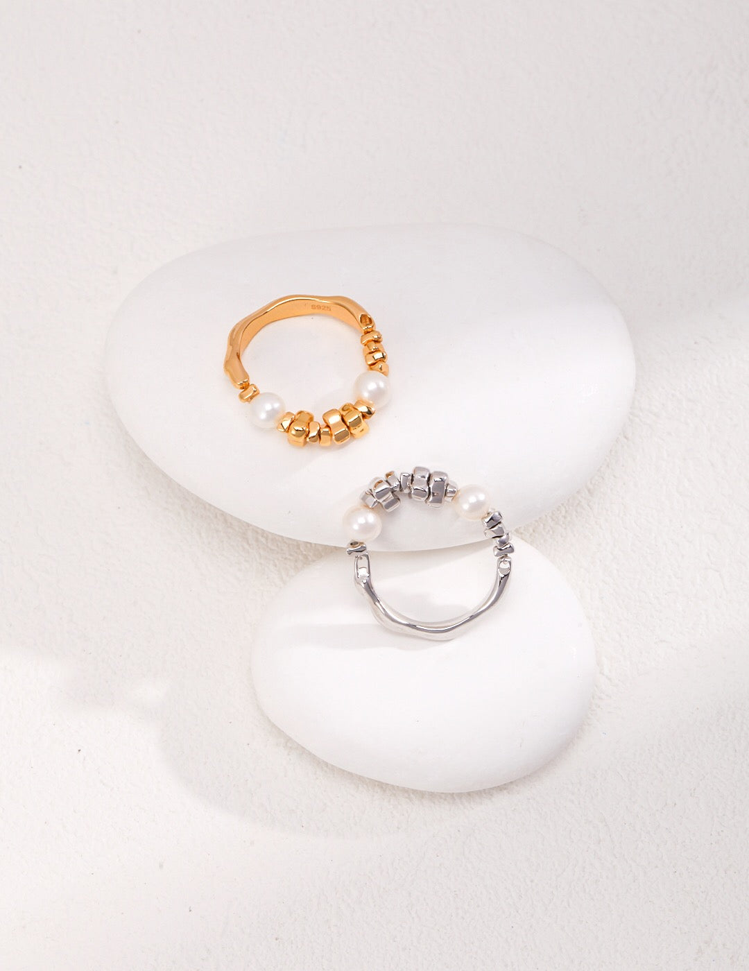 A stunning Broken Silver Beaded Pearl Ring featuring freshwater pearls set in sterling silver with gold vermeil plating, elegantly displayed.