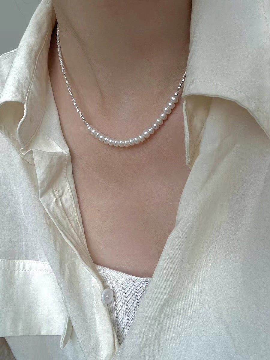 A beautiful Broken Silver Natural Pearl Bracelet and Necklace featuring natural pearls and gold vermeil on sterling silver, showcasing elegance and craftsmanship.