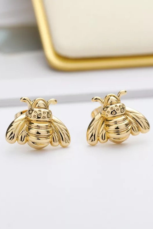 A pair of stylish Bumble Bee Stud Earrings made from plated copper, featuring intricate bee designs.