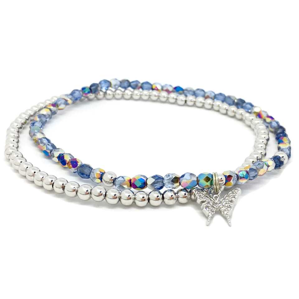 Light blue crystal beaded ankle bracelet set with silver pave butterfly charm, perfect for summer wear.