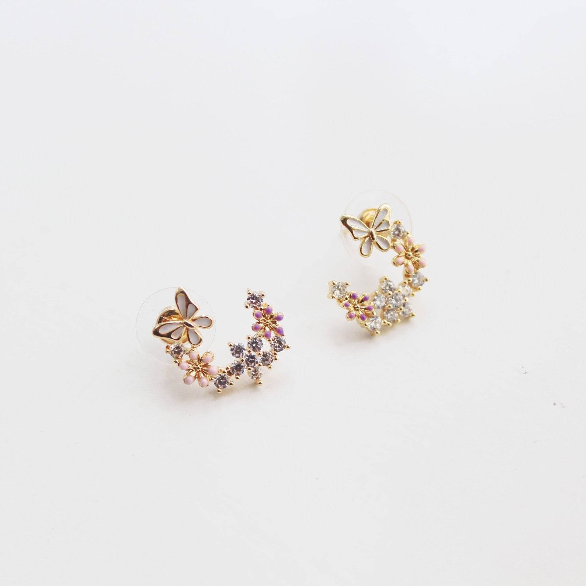 Elegant butterfly earrings featuring cherry blossom design, crafted from sterling silver and gold plated bronze.