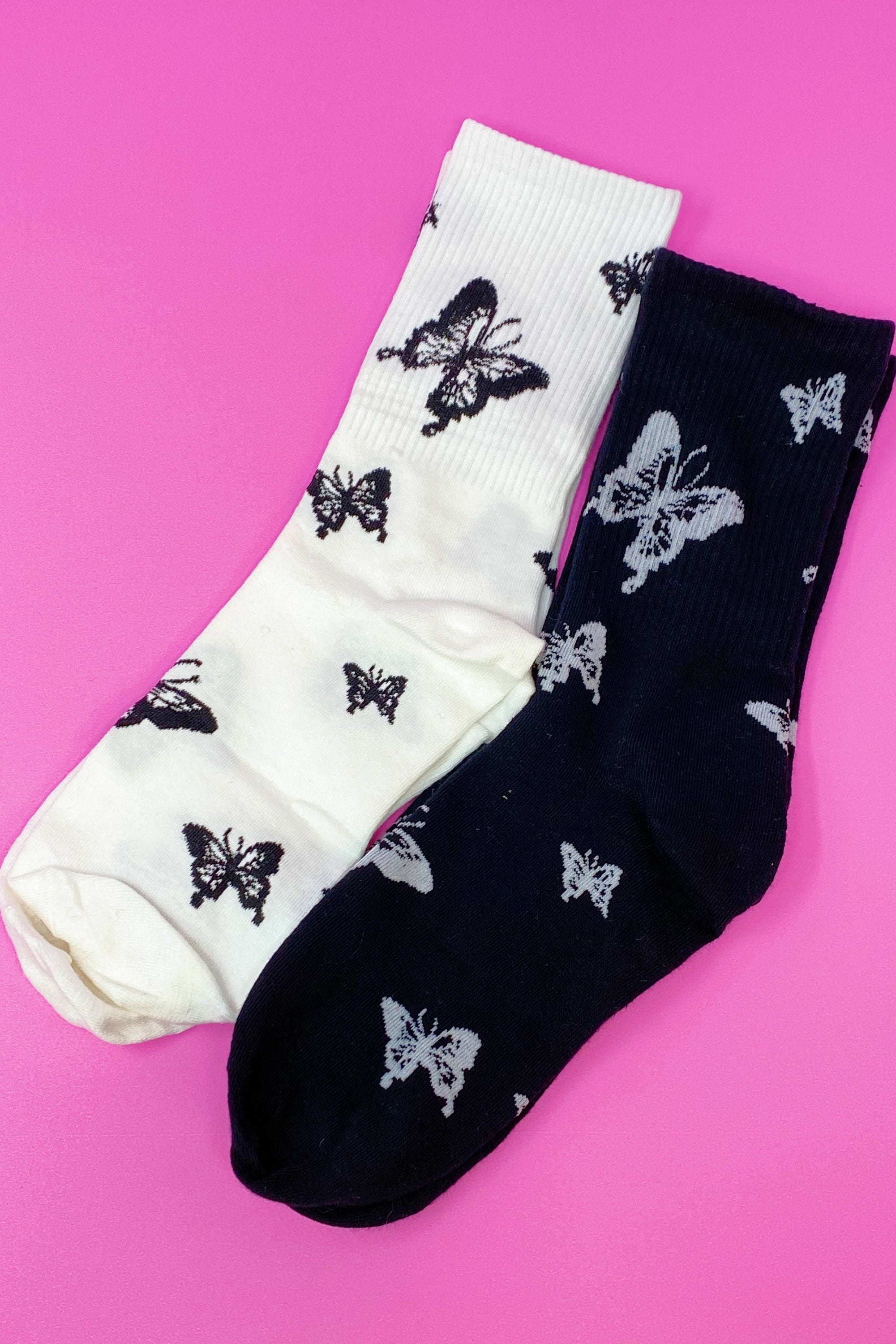 Butterfly In The Air Socks Set featuring colorful butterfly designs, packaged in a clear cello bag with logo sticker.