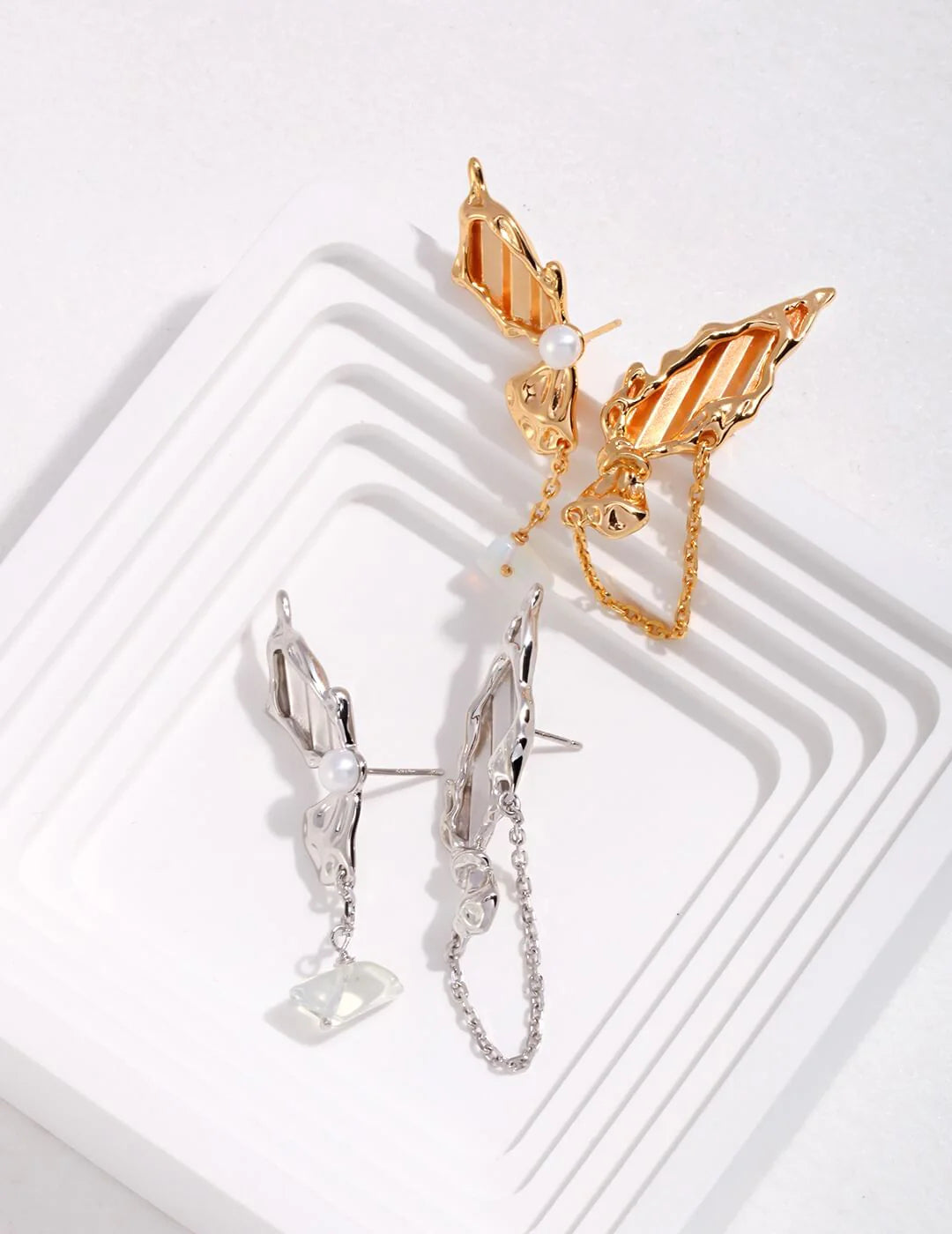 Elegant Butterfly Pearl Earrings made of sterling silver and gold vermeil, showcasing a unique butterfly design.