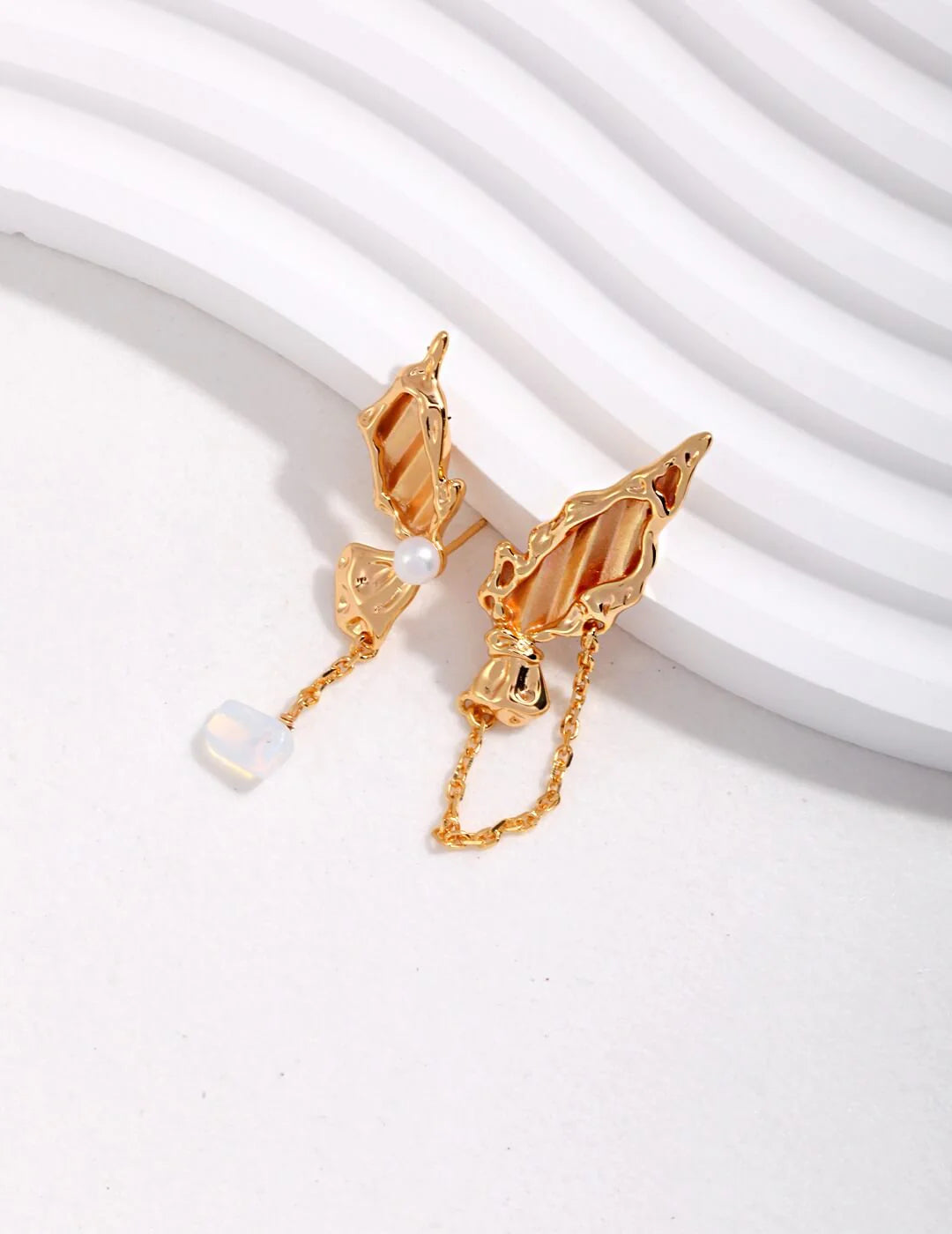 Elegant Butterfly Pearl Earrings made of sterling silver and gold vermeil, showcasing a unique butterfly design.